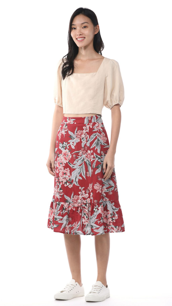 Puff-sleeved top with a midi skirt